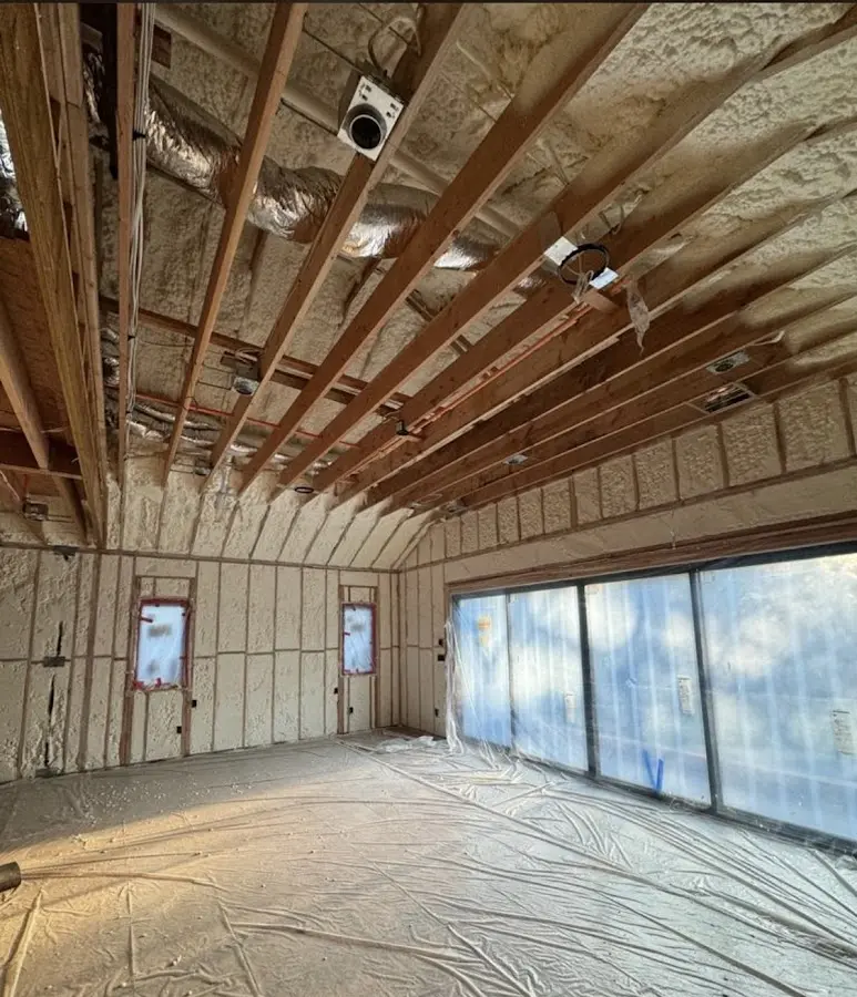 Interior walls and ceiling insulated with spray foam during new construction in Glassboro